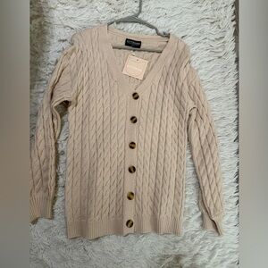 Cable knit cardigan. New with tags. Size small